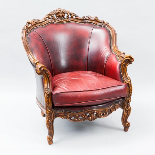 Lot 1024 - OXBLOOD LEATHER AND CARVED MAHOGANY SUITE...