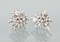 Lot 1660 - PAIR OF DIAMOND CLUSTER EARRINGS each set with...