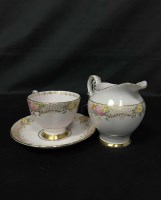 Lot 122 - TUSCAN TEA SERVICE decorated with flowers in...