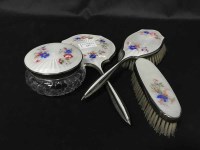 Lot 237 - SILVER PLATED AND ENAMEL BACKED FOUR PIECE...