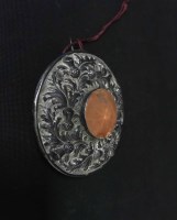 Lot 332 - WHITE METAL KILT PIN with amber coloured stone