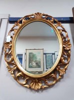 Lot 514 - GILT FLORAL OVAL WALL MIRROR