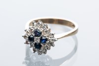 Lot 2016 - SAPPHIRE AND DIAMOND CLUSTER RING set with...