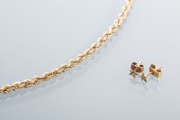Lot 2034 - NINE CARAT GOLD TWISTED ROPE LINK NECKLACE...