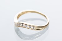 Lot 2066 - DIAMOND HALF ETERNITY RING of curved form,...