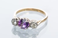 Lot 2106 - AMETHYST AND DIAMOND THREE STONE RING the...