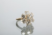 Lot 2115 - DIAMOND CLUSTER RING the floral cluster of...