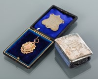 Lot 718 - NINE CARAT GOLD CRICKET MEDAL presented to M....