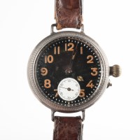 Lot 1561 - WWI TRENCH WATCH the black dial with Arabic...