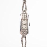Lot 1563 - ART DECO DIAMOND COCKTAIL WATCH of stepped...
