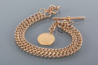 Lot 1573 - NINE CARAT GOLD ALBERT CHAIN with curb links...