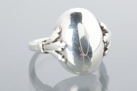 Lot 1637 - GEORG JENSEN SILVER RING the oval bezel set on...