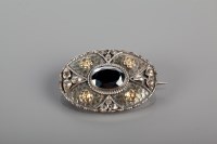 Lot 1640A - ARTS AND CRAFTS BROOCH of oval form, set with...