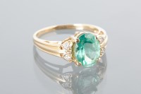 Lot 1646 - EMERALD AND DIAMOND RING set with a single...