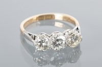 Lot 1647 - DIAMOND THREE STONE RING the three brilliant...