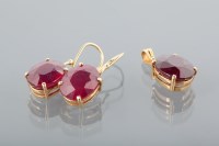 Lot 1657 - EIGHTEEN CARAT GOLD RUBY SET DROP PENDANT set...