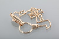 Lot 1661 - NINE CARAT GOLD KEY CHAIN with long links and...