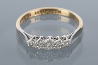 Lot 1703 - MID TWENTIETH CENTURY DIAMOND FIVE STONE RING...