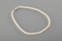 Lot 1716A - MIKIMOTO PEARL NECKLACE with a fourteen carat...