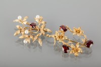 Lot 1724A - TWO GARNET SET FLORAL SPRAY BROOCHES both in...