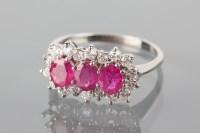 Lot 1740A - RUBY AND DIAMOND CLUSTER RING set with three...