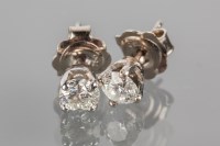 Lot 1752A - PAIR OF DIAMOND STUD EARRINGS each set with a...