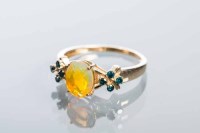 Lot 2189 - OPAL AND BLUE DIAMOND DRESS RING with a...