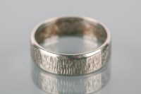 Lot 1779A - EIGHTEEN CARAT WHITE GOLD WEDDING BAND with...