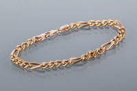 Lot 1783 - FOURTEEN CARAT GOLD CURB LINK BRACELET marked...