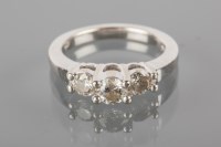 Lot 1794 - DIAMOND THREE STONE RING the brilliant cut...