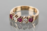 Lot 1795 - RUBY AND DIAMOND FIVE STONE RING set with...