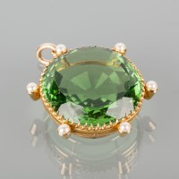 Lot 1800A - OUTSTANDING PERIDOT PENDANT the large oval...