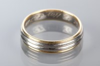 Lot 1815 - PLATINUM AND EIGHTEEN CARAT GOLD BI COLOUR...