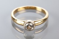 Lot 1815A - DIAMOND SOLITAIRE RING the central brilliant...