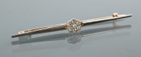 Lot 1816A - DIAMOND CLUSTER BAR BROOCH set with a floral...