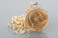 Lot 1499 - HALF SOVEREIGN DATED 1905 in a nine carat gold...