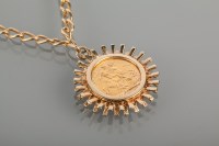 Lot 1543 - SOVEREIGN DATED 1909 in a nine carat gold...