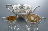 Lot 284 - EARLY 20TH CENTURY SILVER PLATED THREE PIECE...