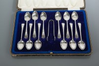 Lot 310 - SET OF TWELVE SILVER TEASPOONS AND SUGAR TONGS...