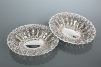 Lot 331 - PAIR OF LATE VICTORIAN PIERCED SILVER BON BON...