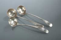 Lot 375 - THREE SCOTTISH GEORGE III SILVER SAUCE LADLES...