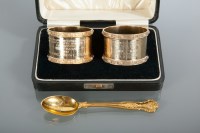 Lot 379 - PAIR OF NINE CARAT GOLD NAPKIN RINGS maker...