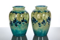 Lot 462 - PAIR OF MOORCROFT 'LEAF AND BERRY' PATTERN...