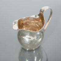 Lot 333 - GEORGE III NEO-CLASSICAL STYLE SILVER MILK JUG...