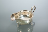 Lot 361 - GEORGE V SILVER SAUCE BOAT maker Adie Brothers...