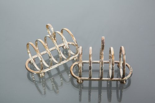 Lot 383 - TWO PAIRS OF SILVER FOUR SLICE TOAST RACKS...