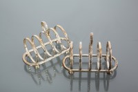 Lot 383 - TWO PAIRS OF SILVER FOUR SLICE TOAST RACKS...