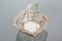 Lot 390 - LATE VICTORIAN PIERCED SILVER BASKET maker...