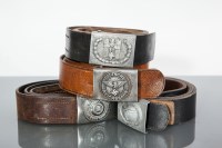 Lot 984 - FOUR THIRD REICH BELT BUCKLES AND LEATHER...
