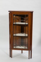 Lot 1144 - MAHOGANY CORNER CABINET OF GEORGE III DESIGN...